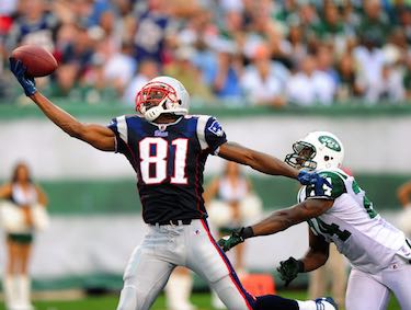 Randy Moss (Wide Receiver) catching a ball with one hand