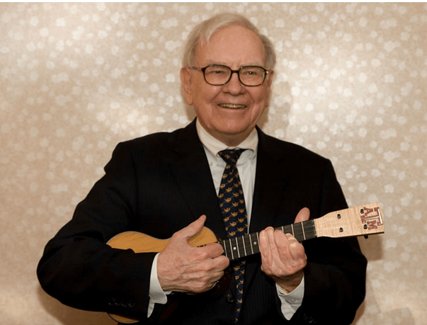 Warren Buffett playing the ukulele